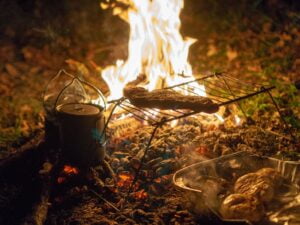 How Can I Improvise a Cooking Setup With Bushcraft Techniques?